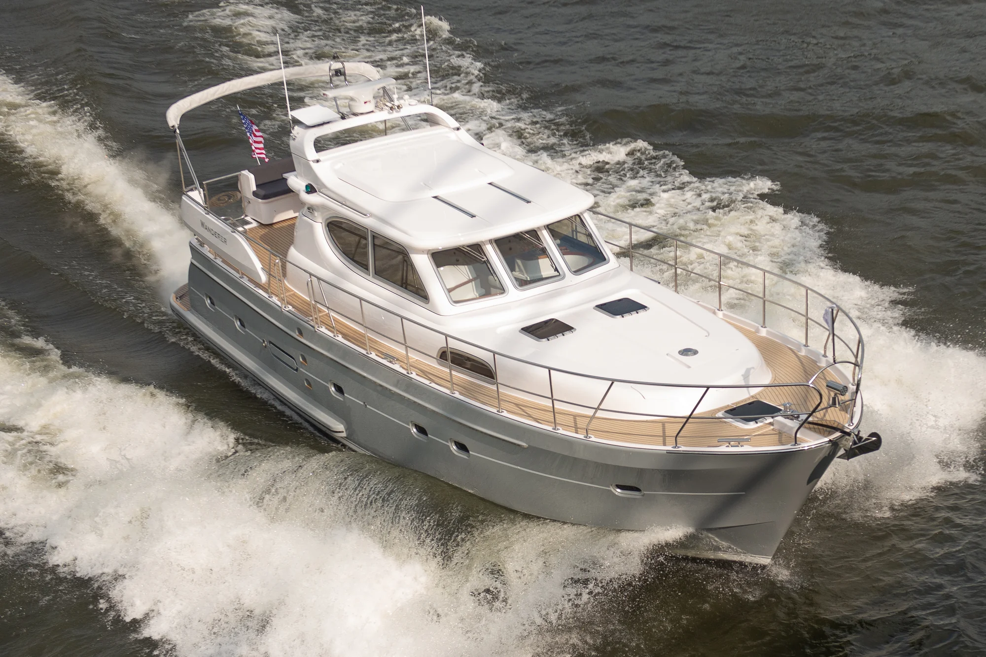 E4-343 underway, viewed from above the bow, showing the foredeck, wheelhouse and wake.